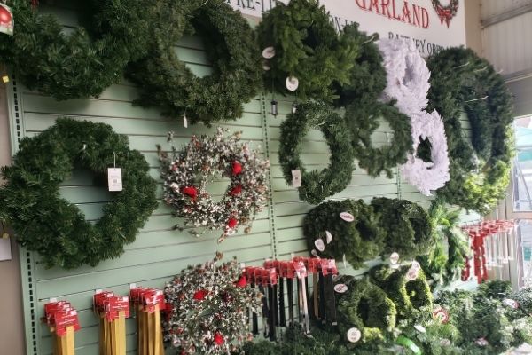 wall of artificial wreaths in many sizes