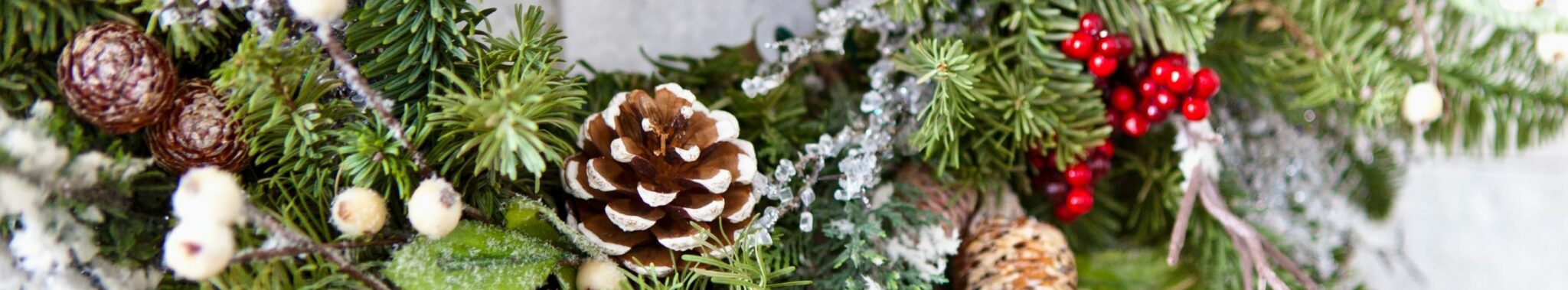 christmas wreath with decorations on door