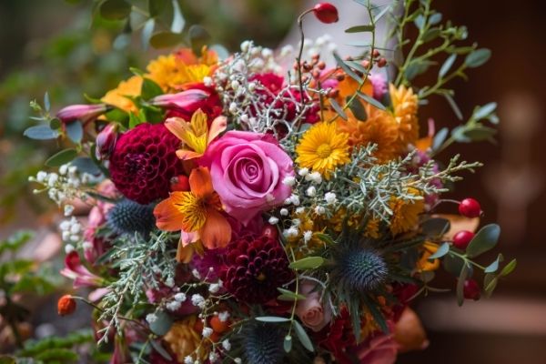 large bouquet with meaningful roses and accent plants