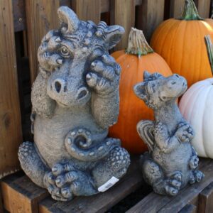 statues with pumpkins