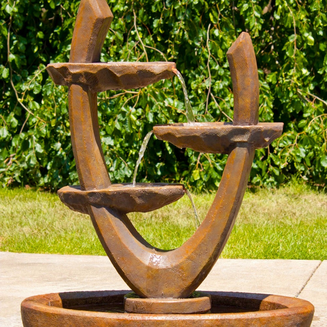Beautifully crafted sculptural fountain with striking design elements and gentle water flow, perfect for enhancing garden aesthetics.